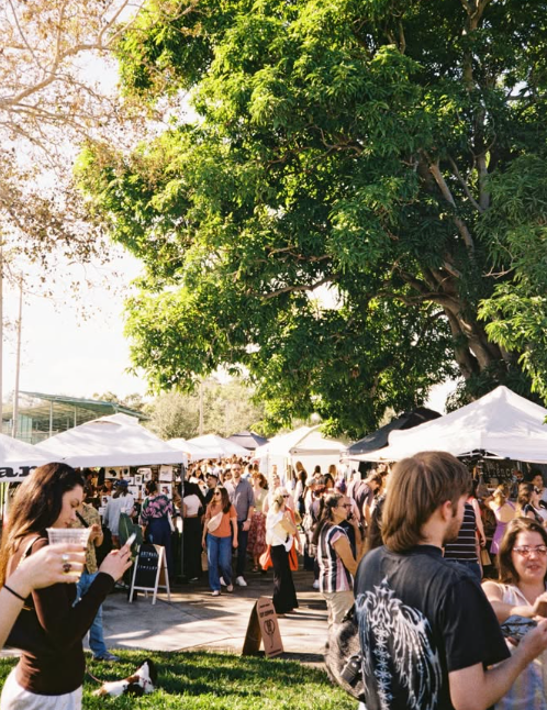 Outdoor crowd and booths